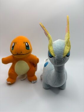 Lot of two Pokémon plush one Charmander.Toy Factory one Amaura Takura Tomy